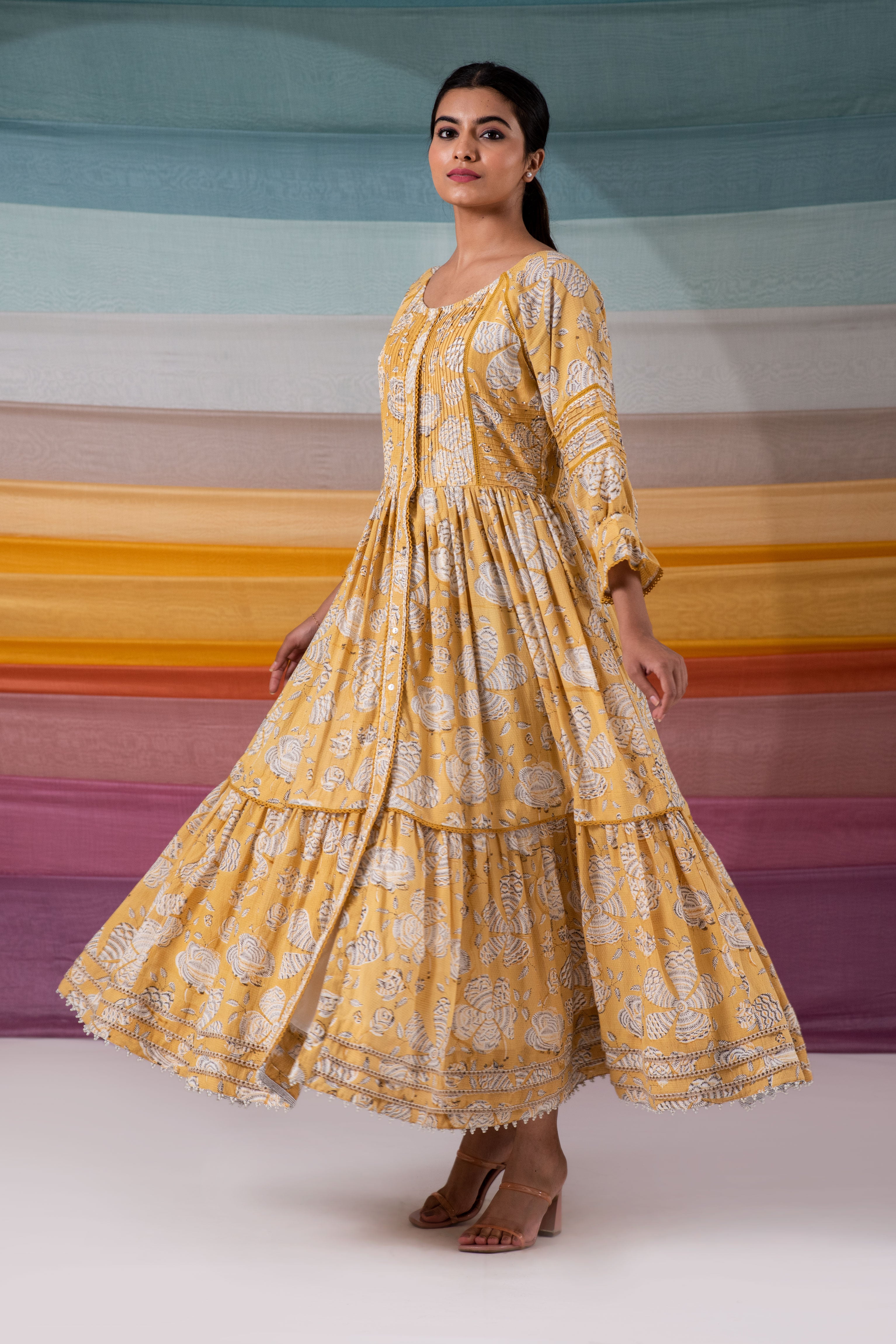 Glimmering yellow pintuck flared maxi dress