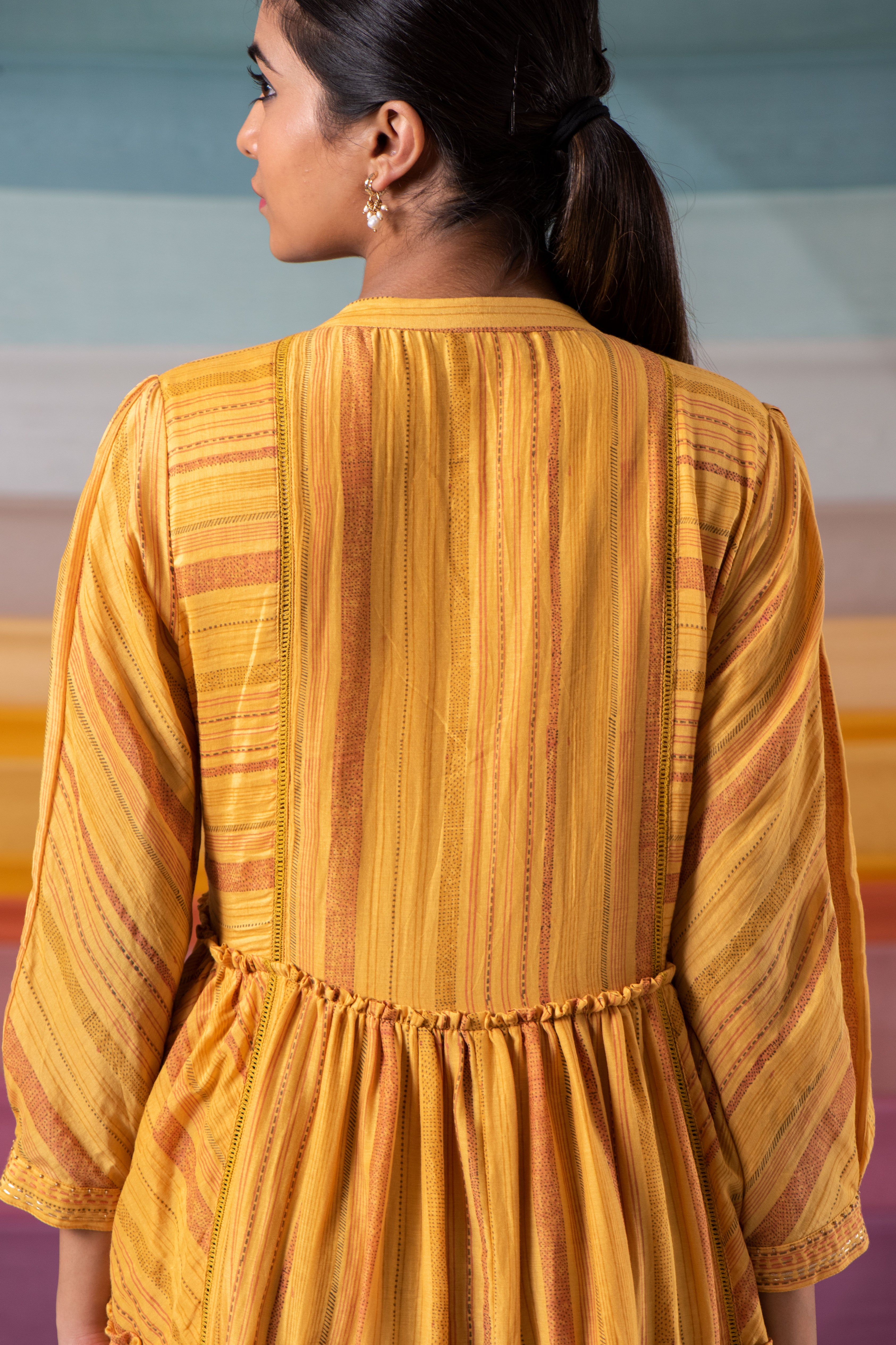 Symmetrical mustard stripe ensemble with kantha increments